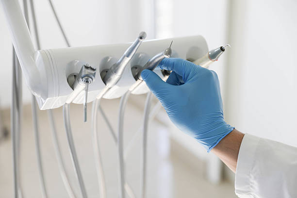 Professional Tooth Extraction technician working in Sunflower County County, MS